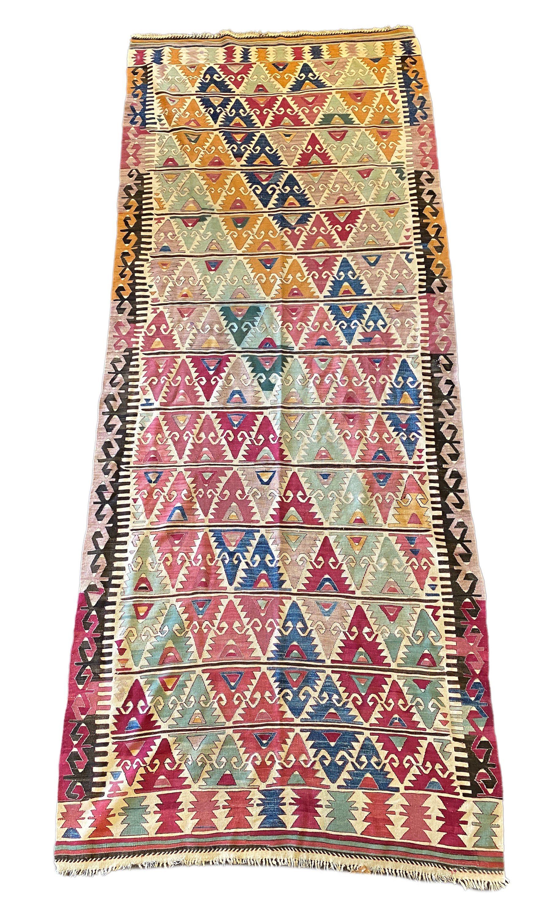 An Anatolian Kilim flatweave polychrome hall carpet, 410 x 156cm